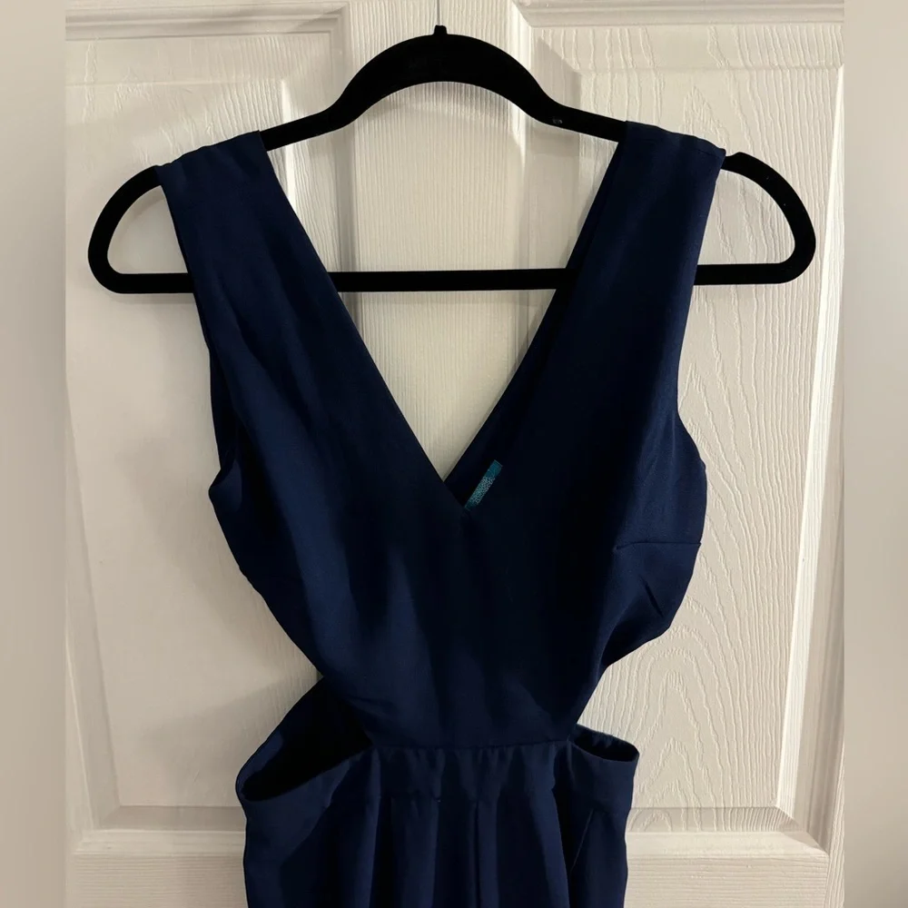 Dark blue jumpsuit with cutouts